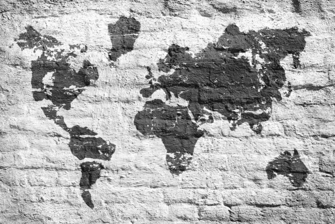 Фотошпалери Картами світу на тлі цегли