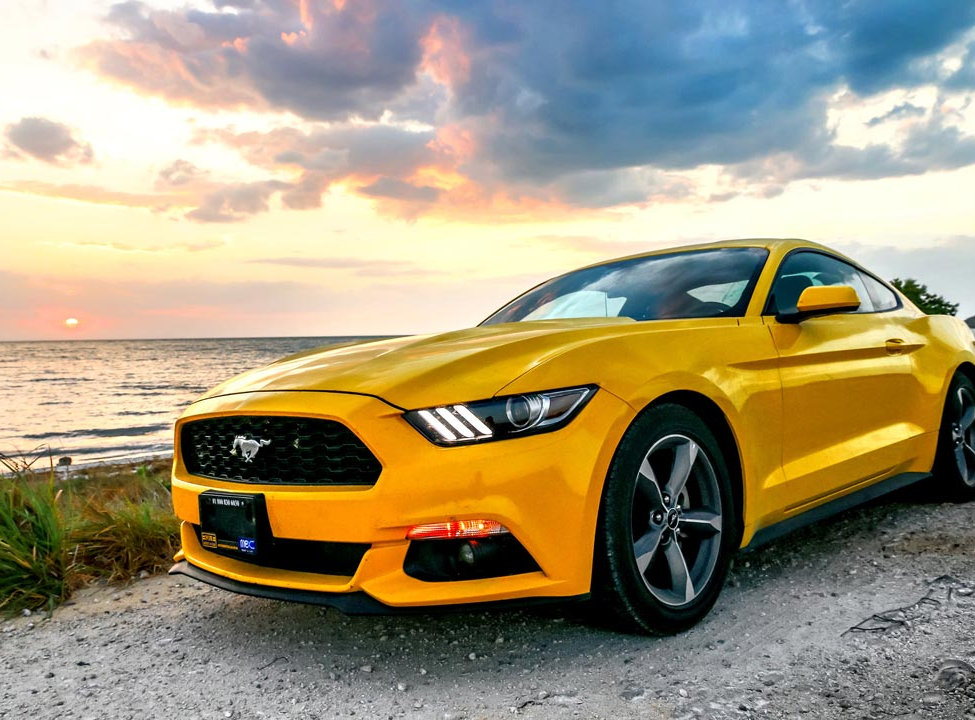 выбрать Фотошпалери машинаи захід сонця Каталог фотошпалер на стіну