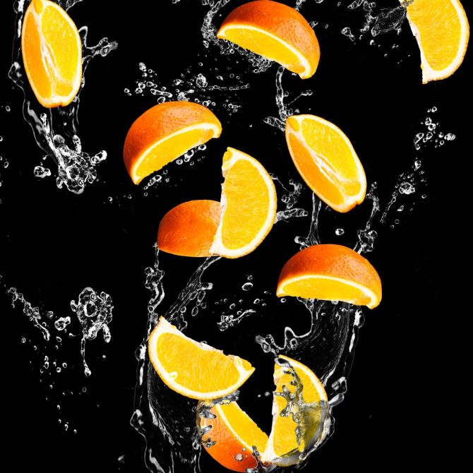 Фотошпалери апельсинкаи на чорному тлі