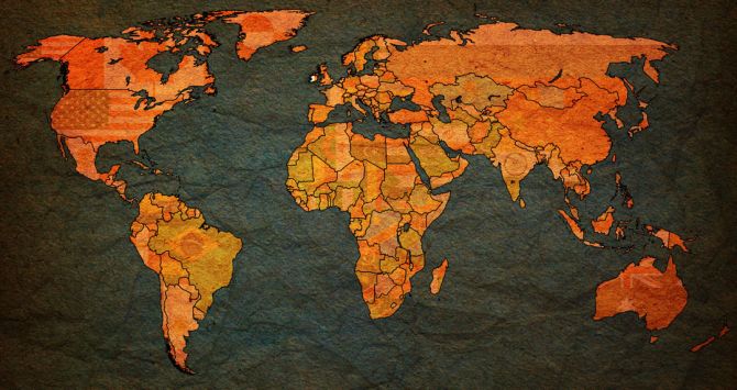 Фотообои Карта  мира на фоне бумаги
