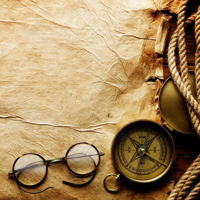 Фотошпалери Компас і окуляри