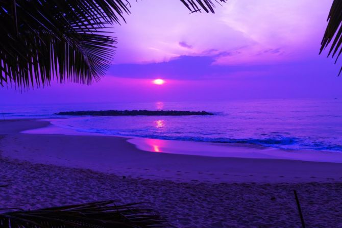 Фотошпалери Фіолетовий захід сонця над морем